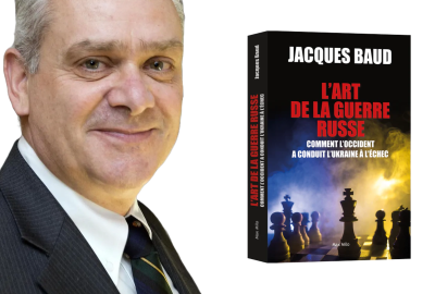 Jacques Baud with his book